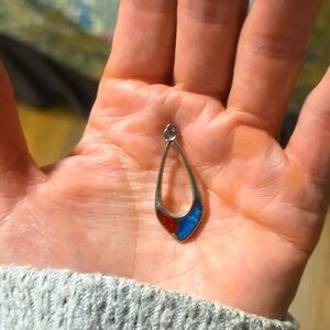 matching handcrafted pendant with earrings and a bracelet.